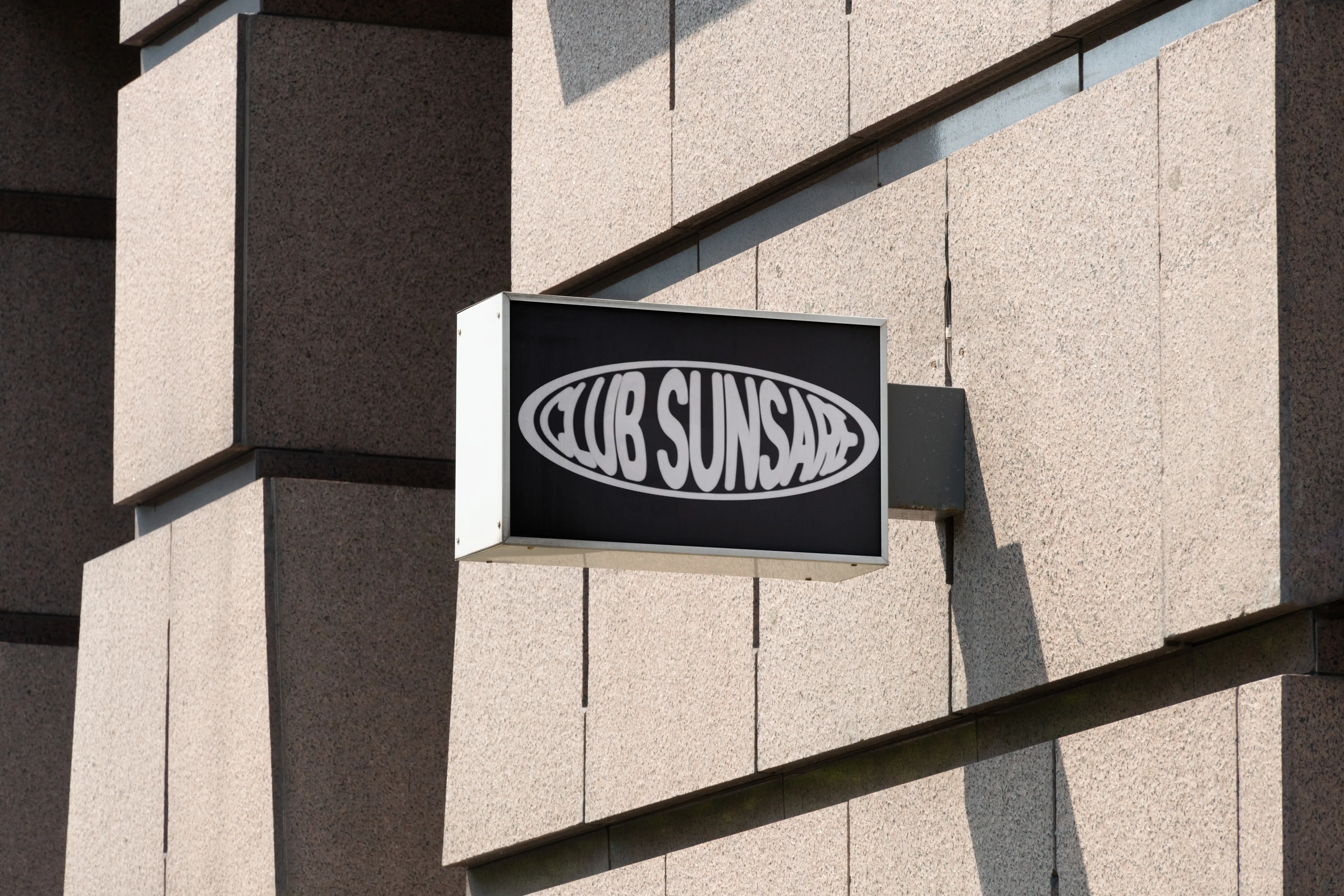 Sunsare editorial layout — logo applications